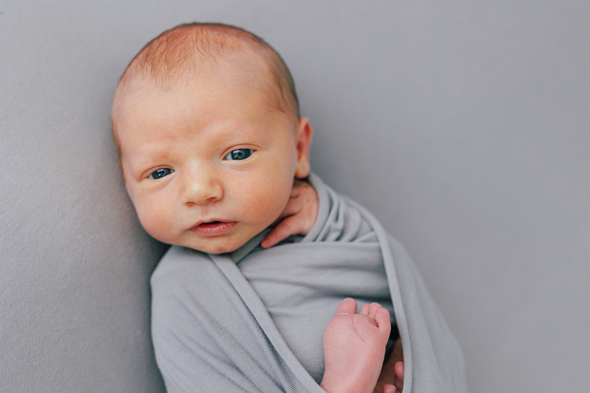 newborn wrapped studio photography
